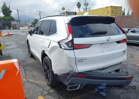 2023 Honda Cr-V Hybrid Sport Touring z USA, uszkodzony, nr VIN 5J6RS6H90PL009467